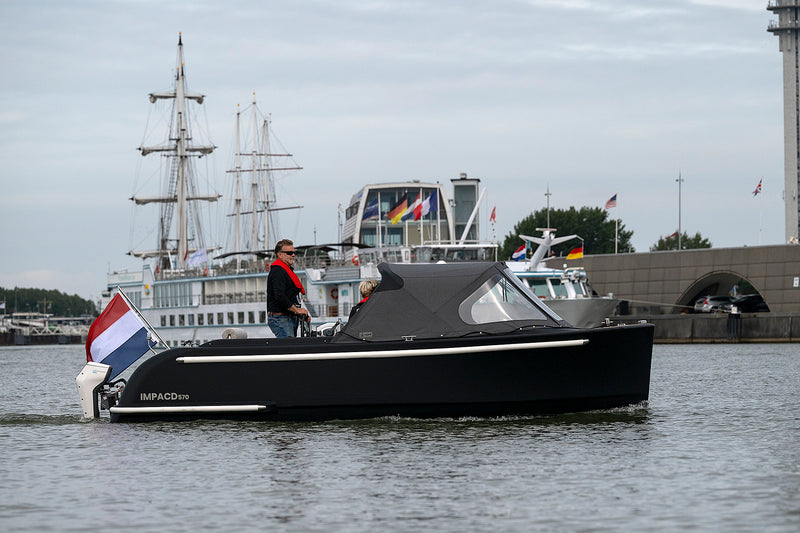 The IMPACD 570 electric 3D-printed tender sloop with Mercury Avactor cruising the water in Lelystad.