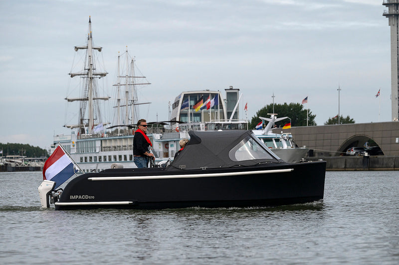 The IMPACD 570 electric 3D-printed tender sloop with Mercury Avactor cruising the water in Lelystad.