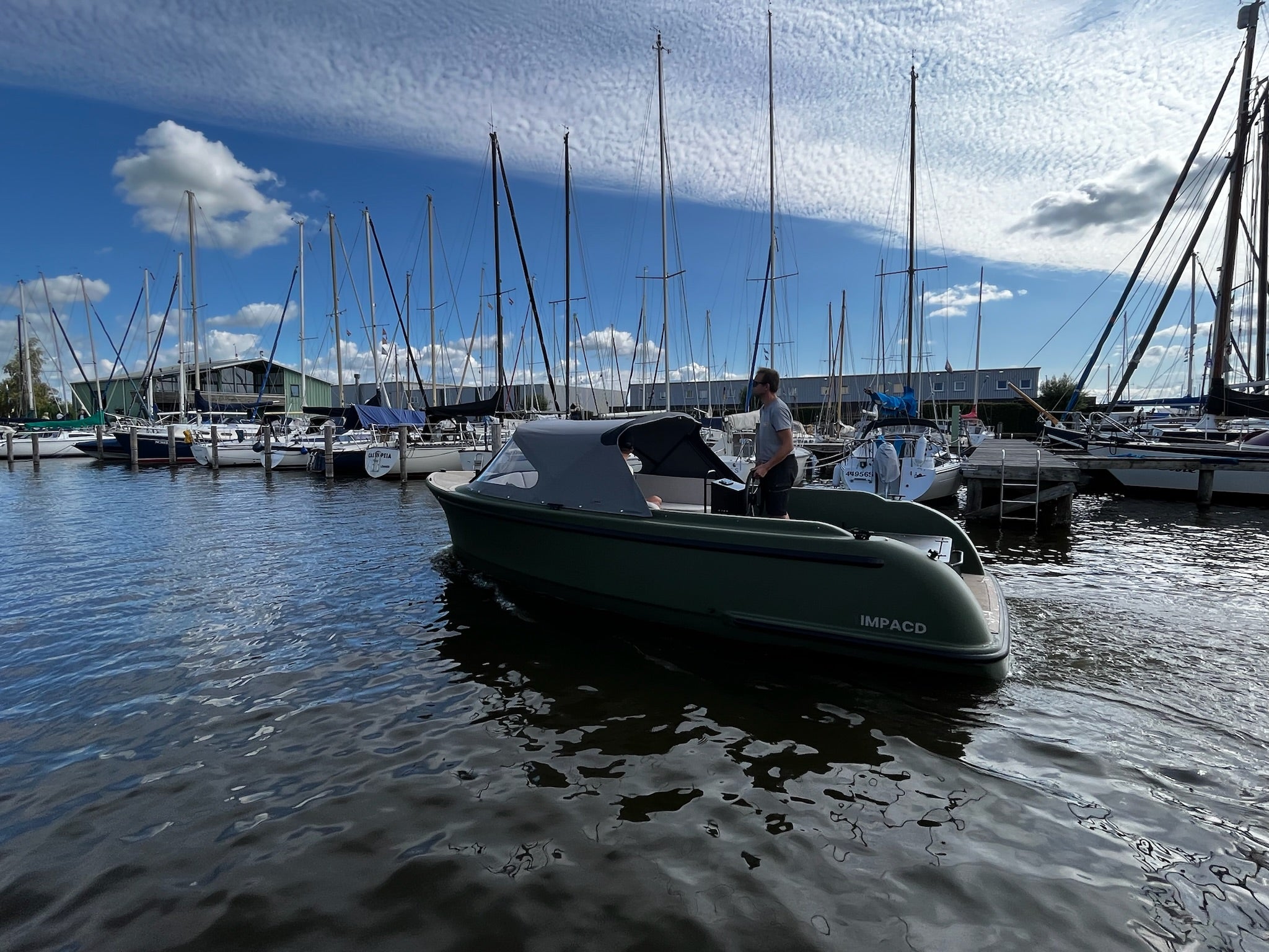 Olivegreen 3D-printed IMPACD 570 sloop cruising at IMPACD Centre