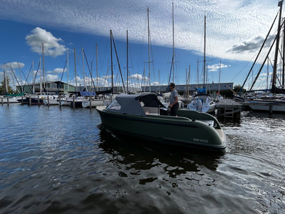 Olivegreen 3D-printed IMPACD 570 sloop cruising at IMPACD Centre