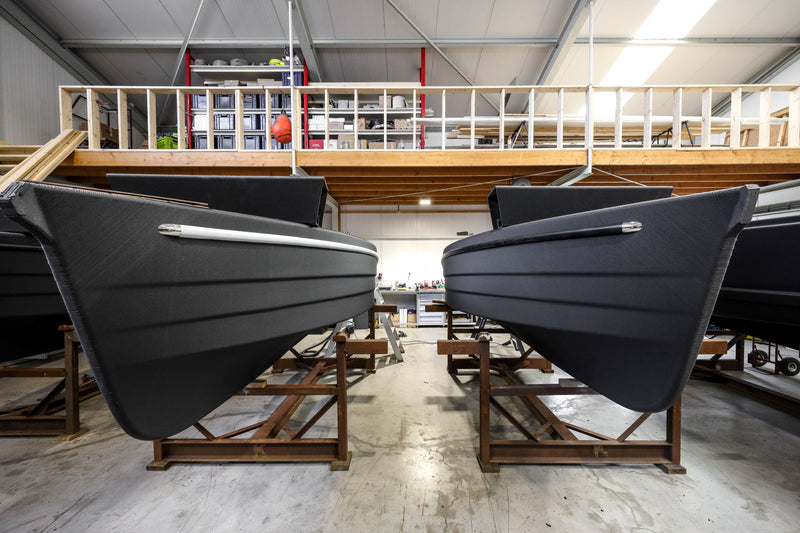 Multiple IMPACD 3D-printed sloops in the assambly hall of the IMPACD centre.