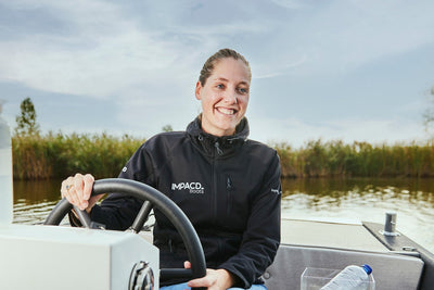 Marieke de Boer, Founder of IMPACD on one of the IMPACD 3D-printed electric sloops